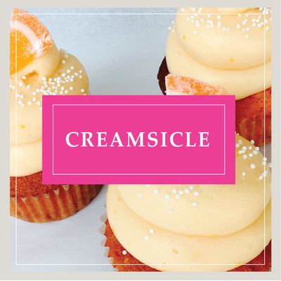 The Creamsicle Tuxedo cupcake at Cupcake DownSouth, a dessert bakery in Charleston, SC and Columbia, SC